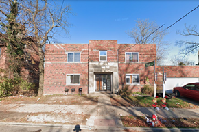 Cincinnati apartment for rent - A red brick house with a white door and windows.