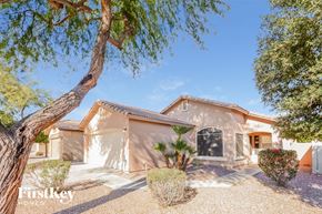 El Mirage house for rent - A house with a tree in front of it.