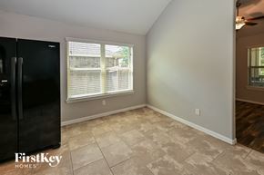 Cypress house for rent - the living room has a large window and tile flooring