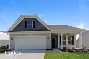 Denver house for rent - a white house with a white garage door