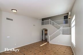 Laveen house for rent - a view of the living room from the top of the stairs