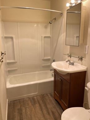 Grandview apartment for rent - a bathroom with a sink and a bath tub