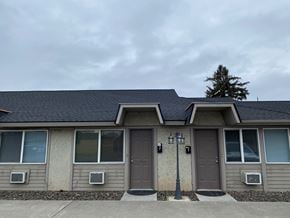 Grandview apartment for rent - the front of a house with two doors and a street light