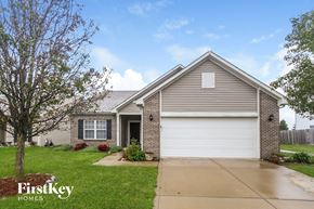 Westfield house for rent - A house with a garage door is for sale by FirstKey Homes.