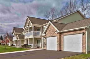 Churchville apartment for rent - a house with a white garage door in front of it
