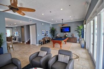 Bradenton house for rent - a large living room with a pool table