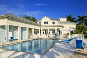 Bradenton house for rent - a large swimming pool in front of a house