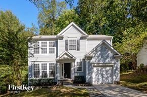 Charlotte house for rent - a white house with white shutters and a driveway