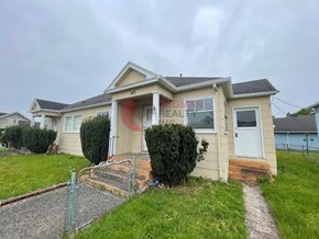 Castle Rock apartment for rent - A house with a sign that says "REAL" on the front.