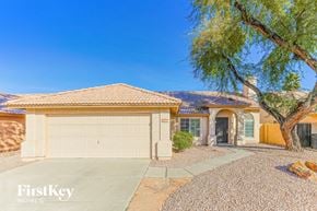 Chandler house for rent - a home with a white garage door