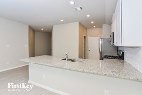 San Antonio house for rent - a kitchen with a counter top and a sink