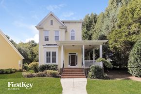 Huntersville house for rent - a white house with white shutters and a porch