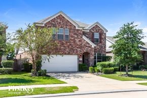 Katy house for rent - A brick house with a garage door and a tree in front.