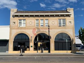 Longview apartment for rent - A brick building with a clock on the front.