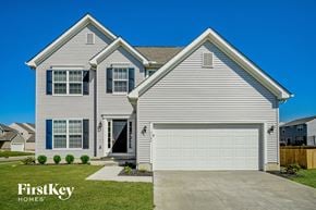 Reynoldsburg house for rent - A two-story house with a garage is for sale by FirstKey Homes.