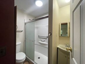 Castle Rock apartment for rent - a bathroom with a toilet and a shower and a sink