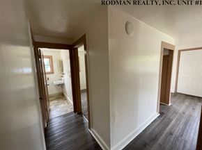 Kelso apartment for rent - a view of the living room from the hallway into the bedroom and the bathroom