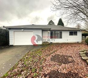 Longview house for rent - A house with a sign that says "Rod Realty" on it.