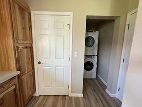 Kelso house for rent - a laundry room with a washer and dryer in it