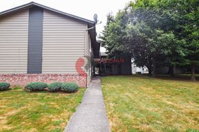 Longview apartment for rent - A house with a red stain on the wall.