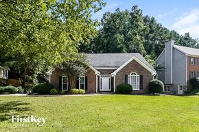 Kennesaw house for rent - A house with a lawn in front of it.