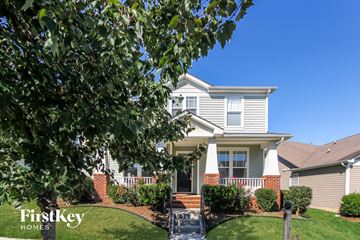Huntersville house for rent - a white house with a tree in front of it