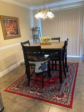 Smyrna apartment for rent - A dining room with a table set for four.