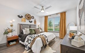 Georgetown apartment for rent - a bedroom with a bed and a ceiling fan