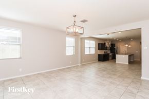 Tolleson house for rent - the living room and kitchen are spacious and clean