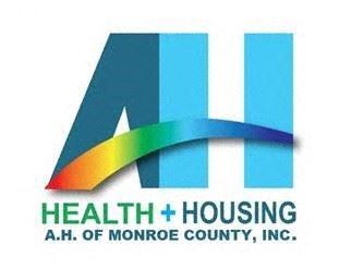 Key West apartment for rent - The logo for the A.I. of Monroe County, Inc. features a stylized "A" and "H" in blue and green.