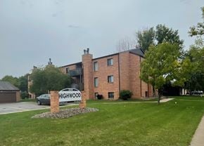 Fargo apartment for rent - a brick building with a sign for highwood apartments