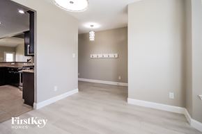 Spring house for rent - a renovated living room and kitchen in a new home