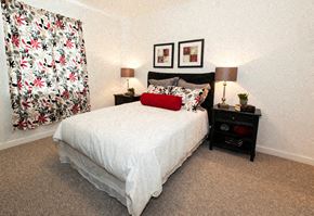 Orlando apartment for rent - a bedroom with a bed and two night stands