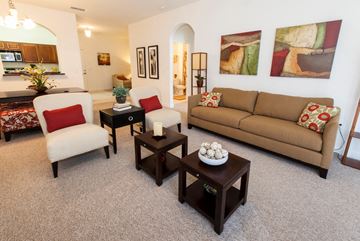 Orlando apartment for rent - a living room with a couch and chairs and