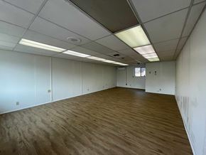 Hayfork apartment for rent - A room with wooden flooring and white walls.