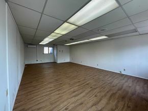 Hayfork apartment for rent - A room with wooden flooring and white walls.