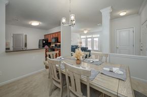Columbus apartment for rent - A dining room with a table set for a meal.