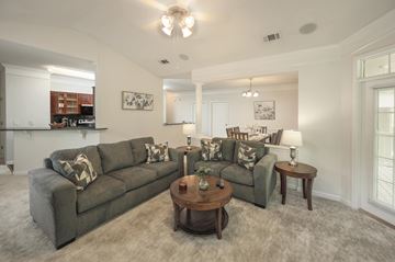 Columbus apartment for rent - A living room with a grey couch and a coffee table.