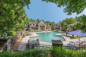 Columbus apartment for rent - A large house with a pool in the backyard.