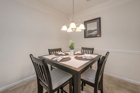 Columbus apartment for rent - A dining room with a table set for four.