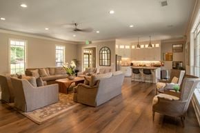 Columbus apartment for rent - A living room with a couch, chairs, and a dining table.