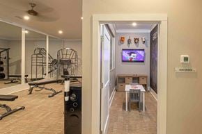 Columbus apartment for rent - A room with a gym and a kid zone.