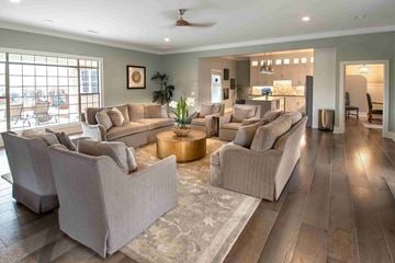 Columbus apartment for rent - A living room with a large sectional sofa and a rug.