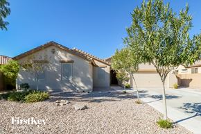 Buckeye house for rent - A house with a tree in front of it.