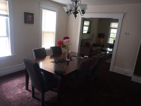 Cleveland apartment for rent - A dining room with a table and chairs.
