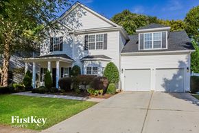 Cornelius house for rent - A large, two-story house with a garage is for sale.