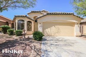 San Tan Valley house for rent - A house with a garage door that says "CWW" on it.