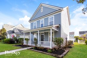 Summerville house for rent - a blue house with white trim and a porch