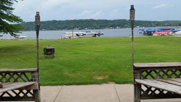 Lodi apartment for rent - a view of the lake from a patio with benches