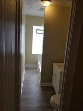 Cleveland apartment for rent - a small bathroom with a sink and a toilet